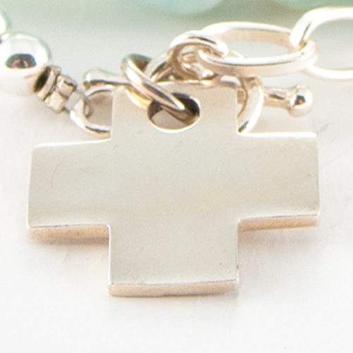 This stunning Cross Charm cast in authentic 925 Sterling Silver.