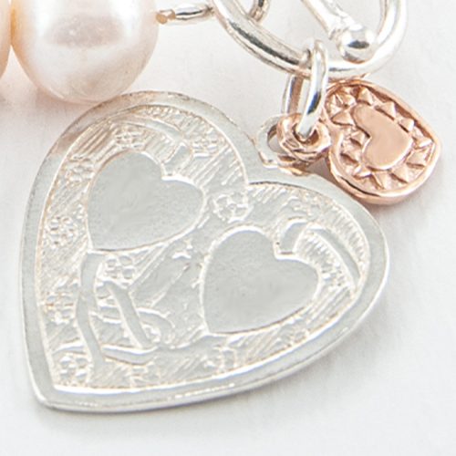 Flat Double Heart Charm, cast in 925 Sterling Silver with a small rose gold plated heart.