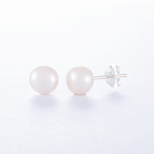 Our Freshwater Pearl Stud Earrings. Shown here, with a stunning 7mm piece, that's both beautiful and elegant. In short, this pair of little gems will make the perfect gift for someone special.