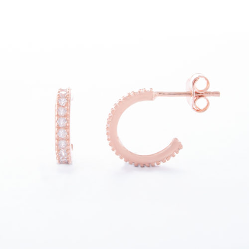 Our Rose Gold Cubic Zirconia Eternity Hoop Earrings. Shown here in 12mm, with multiple small, sparkling CZ on the front face. Beautifully plated over 925 sterling silver. In short, this pair of little gems are full of glamour! The ideal addition to any jewellery collection or as a gift idea for that extra special someone.