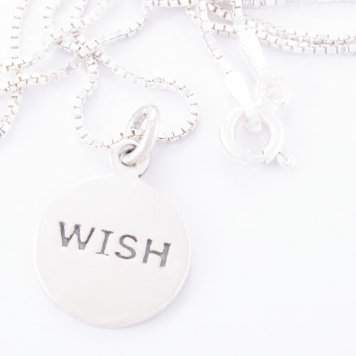 Our Sterling Silver Box Chain Wish Disc Necklace. Shown here, in stunning 925 sterling and stamped "WISH". In short, this beautiful piece is sure to make the best of wishes come true. The perfect gift for someone special or as an addition to any jewelry collection.