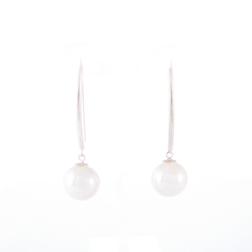 Our White Pearl Drop Earrings. Shown here, hand-made with a beautiful soft finish. In short, this pair of elegant gems are full of style. The perfect piece to complete an outfit or as the ideal gift for someone extra special.