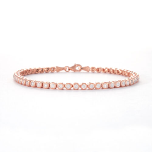 Our 2mm Rose Gold Cubic Zirconia Tennis Bracelet. Shown here, plated over 925 sterling. And, also multiple sparkling round CZ. In short, it's "Game Set and Match"! With this amazing classic piece. The perfect gift for someone extra special. Or as a self-indulgent addition to your personal jewellery collection.