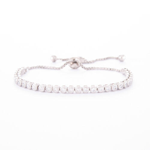 Our 2mm Sterling Silver Cubic Zirconia Adjustable Tennis Bracelet. Shown here, finished in 925 sterling. With multiple round sparkling CZ. In short, this piece is classic, as well as timeless. The perfect gift idea for that someone extra special. Or as a self-indulgent addition to your own jewellery collection.