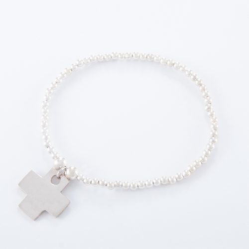 Our Sterling Silver Flat Cross Ball Bracelet. Shown here, with a stunning 925 sterling charm. In short, this amazing piece is sure to bring a big smile. It’s the ideal self indulgent purchase to add to your own jewellery portfolio. Or as the perfect gift idea for that someone extra special.