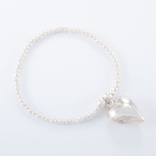 Our Sterling Silver Puffed Heart Ball Bracelet. Shown here, with an amazing 925 sterling charm. In short, this stunning piece is full of love. It’s the perfect self indulgent purchase to add to any personal jewellery collection. Or as the ideal gift idea for that somebody extra special.