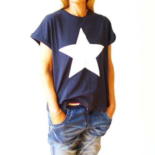 Our Navy Cotton White Star T-Shirt. Shown here, with a lovely cuffed sleeve, as well as a stunning white star. In short, this casual tee is fantastic to wear with jeans or shorts for a relaxed comfy fit. Casually designed yet full of fun and style. Available in 3 fabulous sizes, S, M & L. It’s the perfect self-indulgent summer purchase to add to your own wardrobe. Or as the ideal gift idea for someone special.