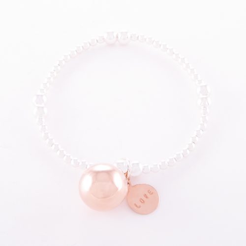 Our Two-Tone Sterling Silver Rose Gold Love Ball Bracelet. Shown here, with a stunning pink gold over 14mm 925 sterling ball charm. As well as a stamped rose over sterling LOVE disc. In short, this is a beautiful piece that’s sure to hit the mark. The ideal self-indulgent purchase to add to your jewellery collection. Or as the perfect gift for someone extra special.