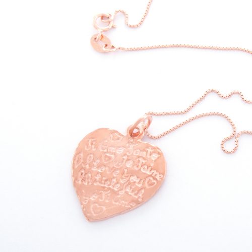 Our Rose Gold Sterling Silver Small Tiamo Heart Necklace. Shown here, with an elegant fine box chain and engraved heart charm. Also handcrafted in beautiful pink gold, plated over authentic 925 sterling. In short, this piece is absolutely stunning. The perfect self-indulgent purchase to add to your personal jewelry collection. Or as an awesome gift for someone very special.