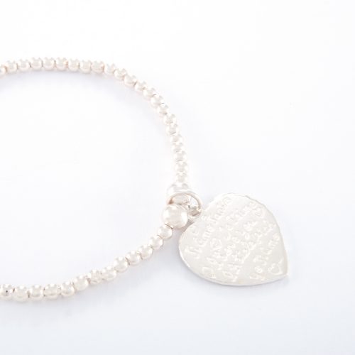 Our Sterling Silver Small Tiamo Heart Ball Bracelet. Shown here, handcrafted with a stunning engraved, 925 sterling Charm. In short, this beautiful piece is full of elegance and love. It’s the ideal self -indulgent purchase to add to your jewelry collection. Or as the perfect gift idea for someone very special.