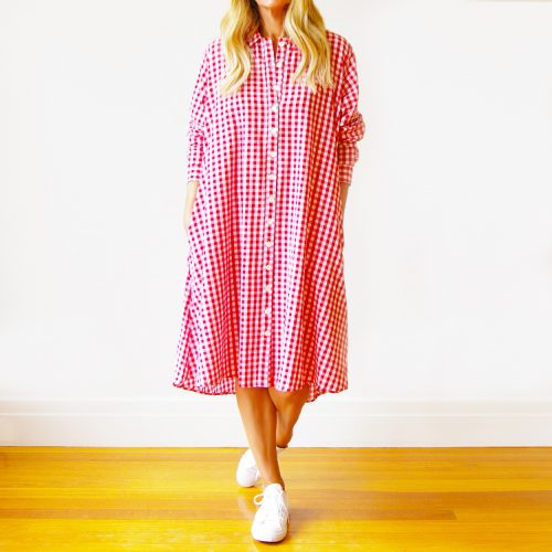 Our Millie Gingham Shirt Dress (Red and White). Is an absolute stunner. Shown here, in 100% pure cotton, a unique a-line shape, crisp collar, and button-up front. As well as comfy side pockets, cuffed sleeves, and medium-size check. What’s more, our amazing Millie comes in 3 sizes and offers a free-size relaxed fit. An XS for ladies 8-10, an S/M for ladies size 12-14, and an M/L for 14-16. In short, it’s the ideal self-indulgent purchase to add to your wardrobe. Or as the perfect gift idea for someone very special.