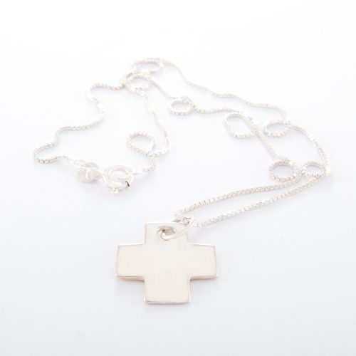 Our Sterling Silver Box Chain Necklace with Small Flat Cross. Shown here, handcrafted beautifully in 925 sterling with a secure parrot clasp. In short, this stunning piece is full of elegance. It's the ideal self-indulgent purchase to add to any jewelry collection. Or as the perfect gift for somebody extra special.