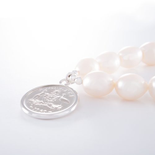 Freshwater Pearl Elastic Bracelet with Sterling Silver Sixpence.